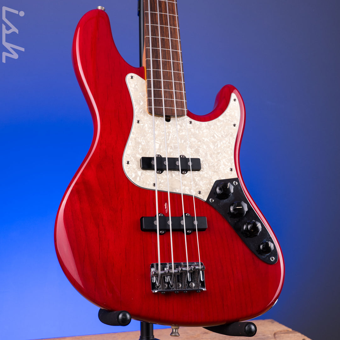 1999 Fender American Deluxe Jazz Bass Fretless 4-String Transparent Crimson Red