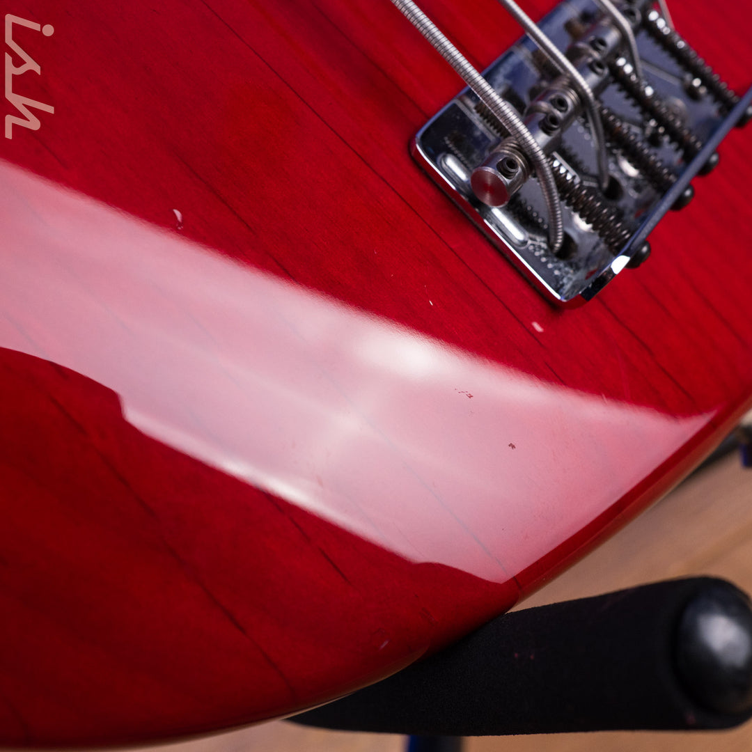 1999 Fender American Deluxe Jazz Bass Fretless 4-String Transparent Crimson Red
