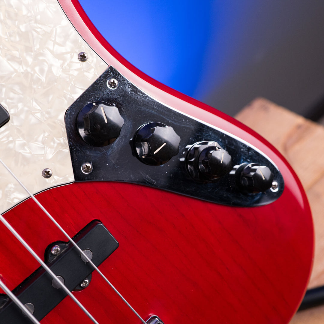 1999 Fender American Deluxe Jazz Bass Fretless 4-String Transparent Crimson Red