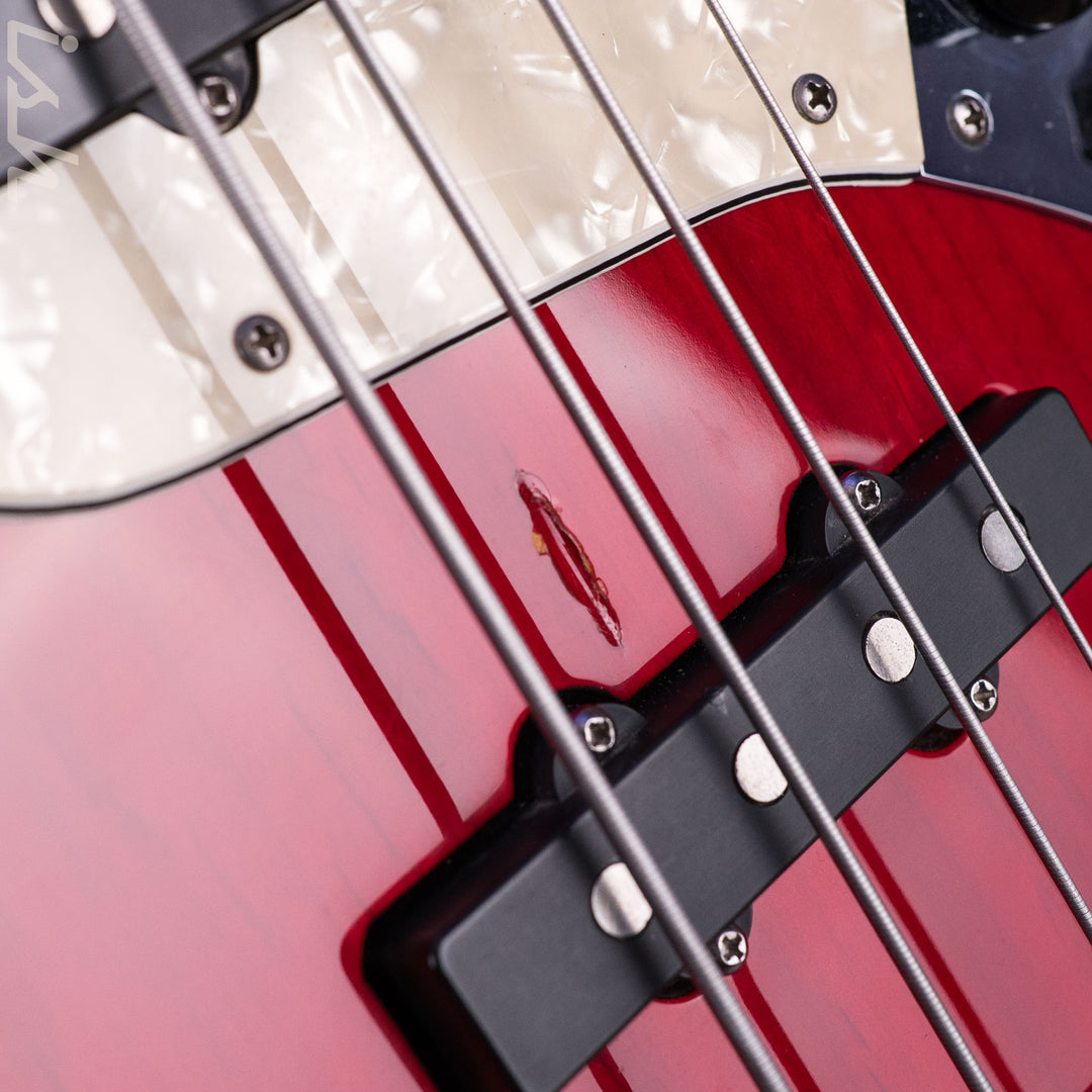 1999 Fender American Deluxe Jazz Bass Fretless 4-String Transparent Crimson Red