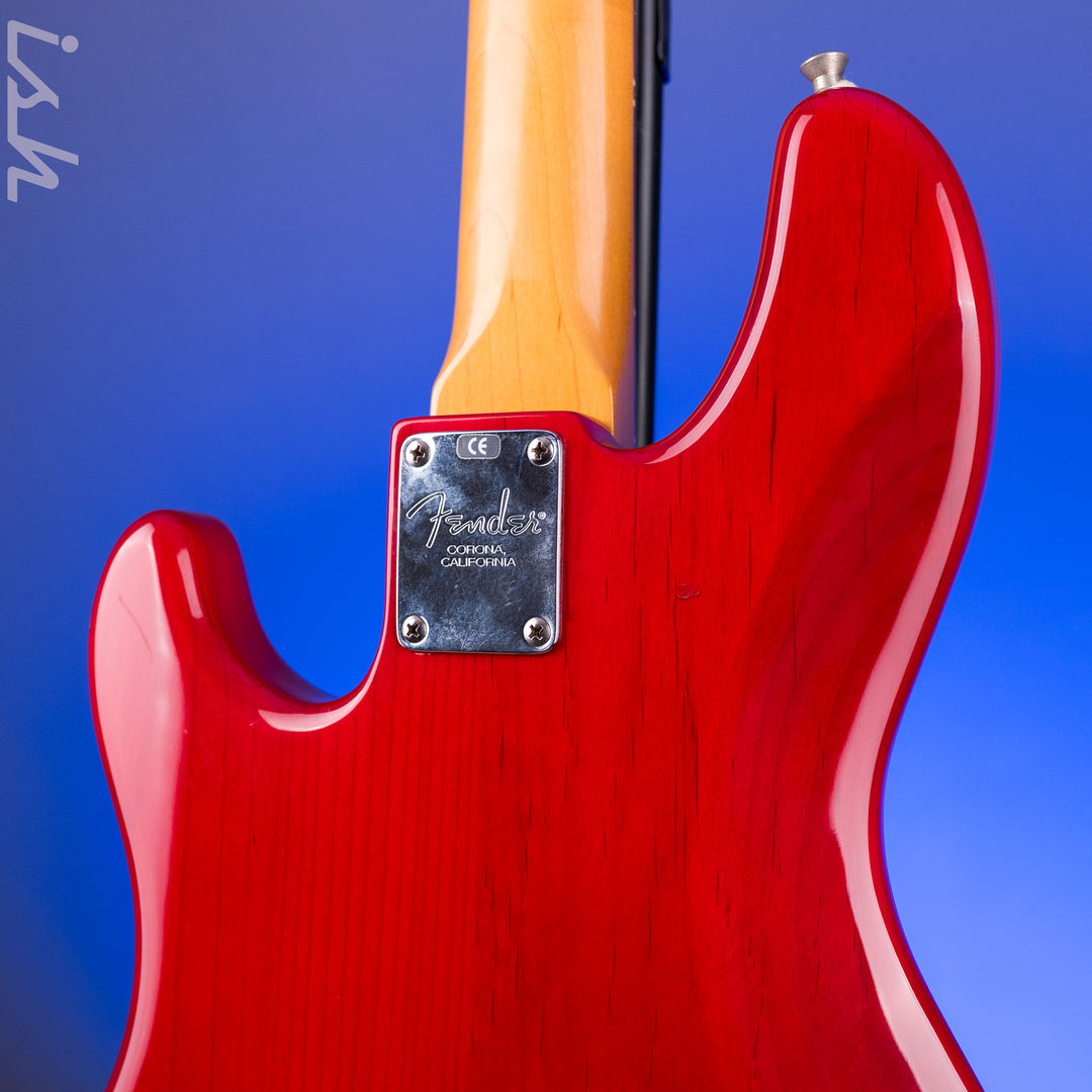 1999 Fender American Deluxe Jazz Bass Fretless 4-String Transparent Crimson Red