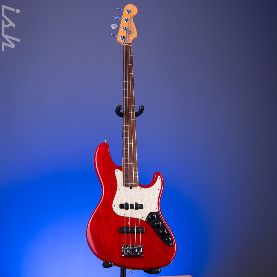 1999 Fender American Deluxe Jazz Bass Fretless 4-String Transparent Crimson Red