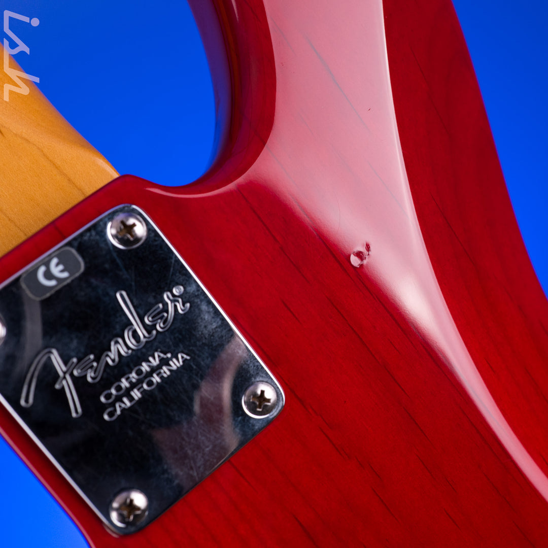 1999 Fender American Deluxe Jazz Bass Fretless 4-String Transparent Crimson Red