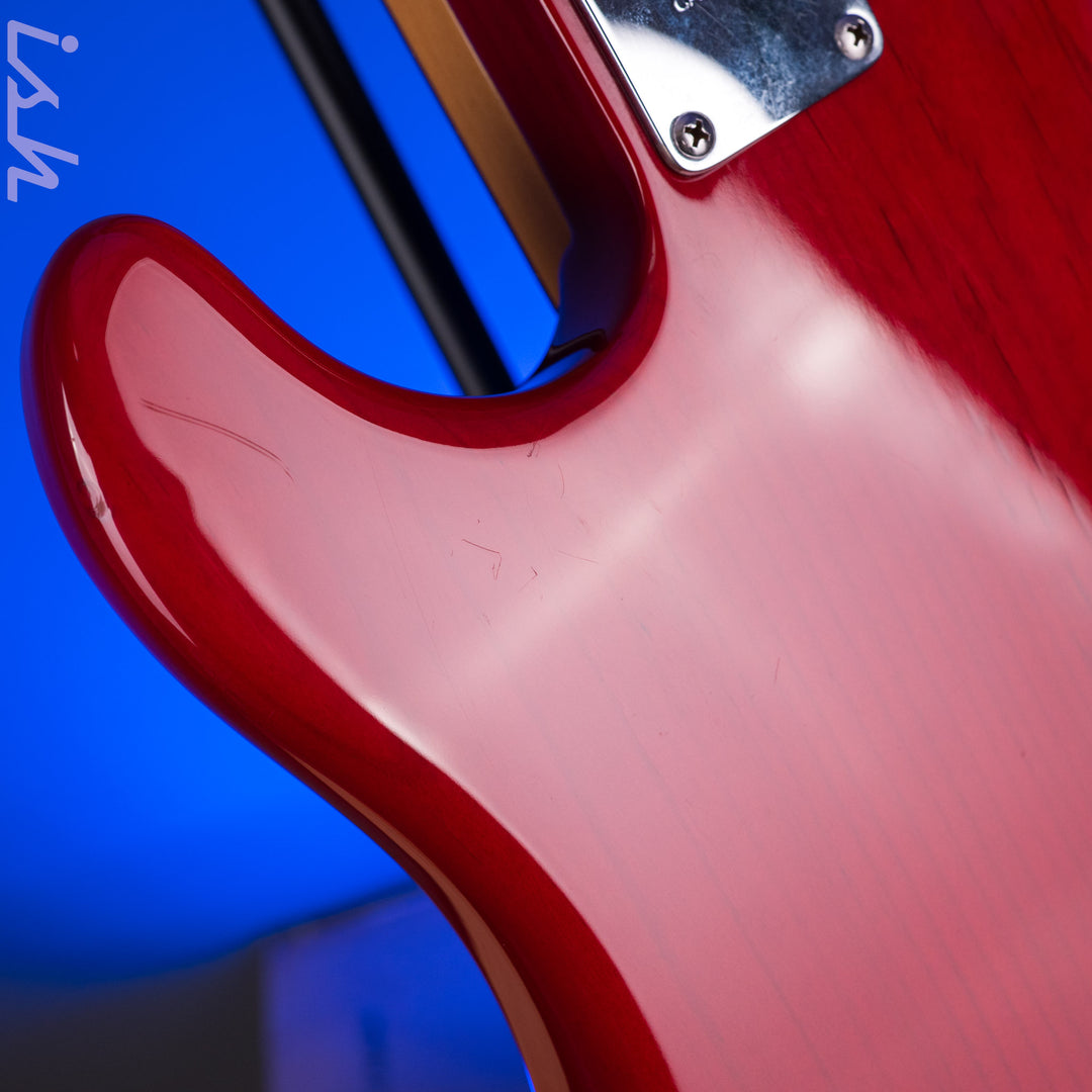 1999 Fender American Deluxe Jazz Bass Fretless 4-String Transparent Crimson Red