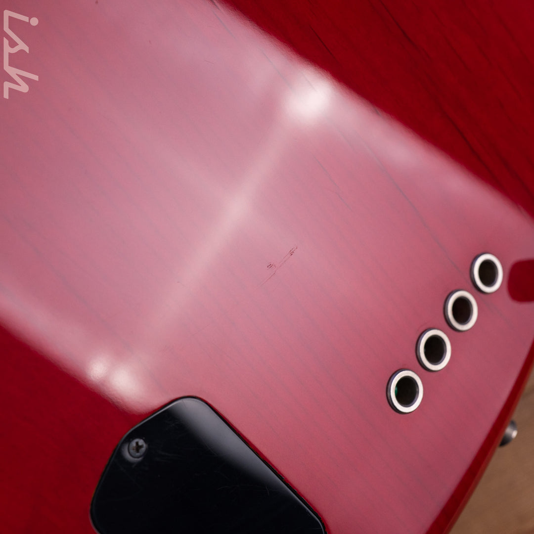 1999 Fender American Deluxe Jazz Bass Fretless 4-String Transparent Crimson Red