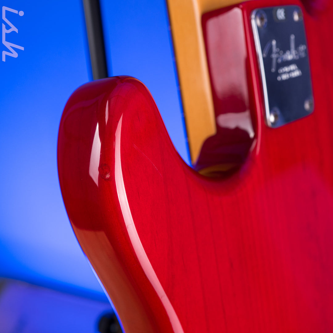 1999 Fender American Deluxe Jazz Bass Fretless 4-String Transparent Crimson Red