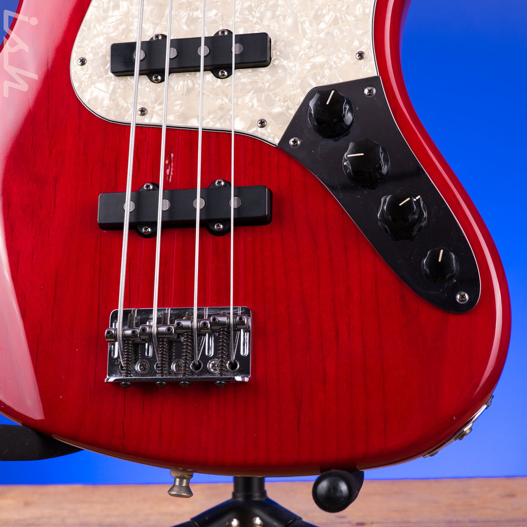1999 Fender American Deluxe Jazz Bass Fretless 4-String Transparent Crimson Red