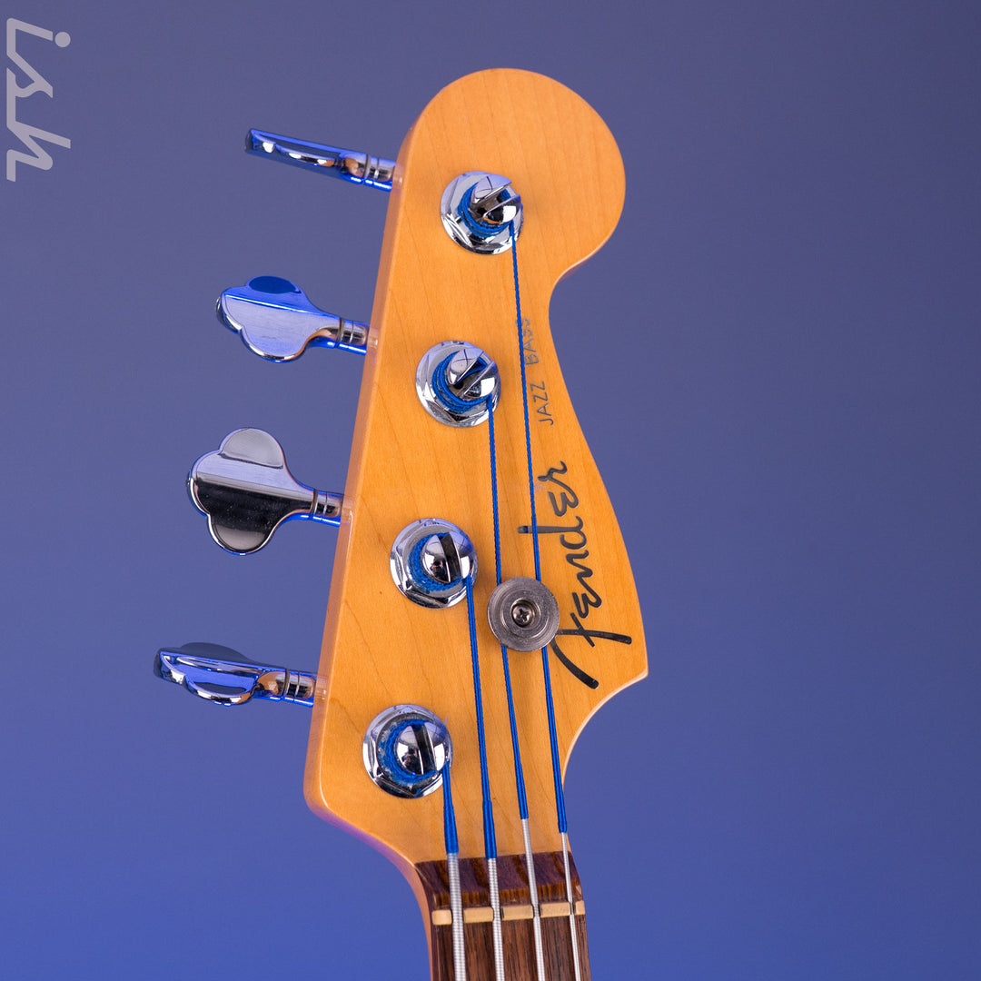 1999 Fender American Deluxe Jazz Bass Fretless 4-String Transparent Crimson Red