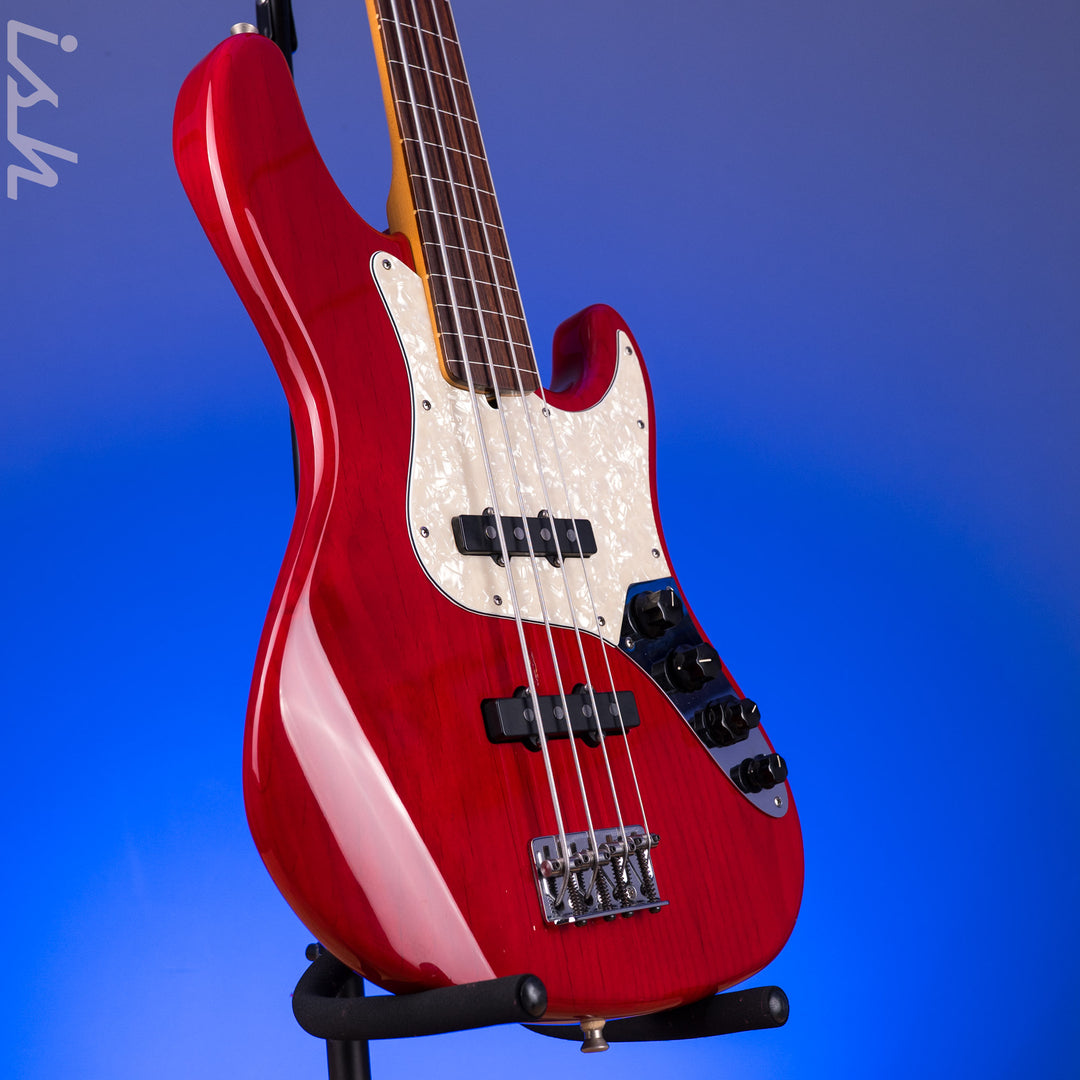 1999 Fender American Deluxe Jazz Bass Fretless 4-String Transparent Crimson Red